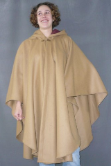 Cloak:1520, Cloak Style:Cape / Ruana, Cloak Color:Camel, Fiber / Weave:100% Wool Melton, Cloak Clasp:Vale - Goldtone, Hood Lining:Burgundy Moleskin, Back Length:44.5", Neck Length:20", Seasons:Winter, Fall, Spring, Note:This tan ruana is made of 100% Wool Melton, a coat-weight fabric.<br>It features a full-sized hood lined with Burgundy Moleskin,<br>and is finished with a gold-tone hook-and-eye clasp.<br>Great for Winter, Spring and Fall,<br>the smaller neck size makes it  a good fit for someone on the smaller side.<br>Now on sale - almost half price!<br>A cross between a cape and a cloak, a ruana is a great way to keep warm when<br>frequent, unhindered use of your arms is needed.<br>Ruanas make great driving cloaks!.