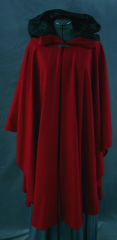 Cloak:1914, Cloak Style:Cape / Ruana, Cloak Color:Red, Fiber / Weave:Wool, Gabardine, Cloak Clasp:Antiquity, Hood Lining:Black embossed leaf moleskin, Back Length:43.5", Neck Length:21.5", Seasons:Spring, Fall, Summer.