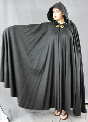 Cloak:1949, Cloak Style:Full Circle Cloak, Cloak Color:Black, Fiber / Weave:Wool / cashmere, Cloak Clasp:Leaf and Scroll - Goldtone, Hood Lining:Green rayon acatate fidelio velvet, Back Length:54", Neck Length:23", Seasons:Winter, Fall, Spring, Note:This heavy full-circle cloak is made of a luxurious wool/cashmere blend <br>that is soft and warm. Full-sized hood is lined with deep green Fidelio velvet,<br> creating a soft contrast. <br>Finished with a stunning handmade Leaf and Scroll hook-and-eye clasp in goldtone..