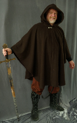 Cloak:1984, Cloak Style:Cape / Ruana, Cloak Color:Brown, Fiber / Weave:Wool / nylon, Cloak Clasp:Dragon Knot, Hood Lining:Rich Green Velvet, Back Length:39", Neck Length:23", Seasons:Southern Winter, Fall, Spring, Note:This cloak features a full-sized hood lined with a rich green velvet<br>and finished with a pewter dragon knot clasp.<br>Great for  mild Winter temperatures or Spring and Fall,<br>the smaller neck size makes it  a good fit for someone on the smaller side.<br>Now on sale!<br> A cross between a cape and a cloak, a ruana is a great way to keep warm<br>when  frequent, unhindered use of your arms is needed.<br>Ruanas make great driving cloaks!.