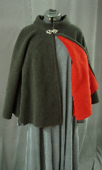 Cloak:1989, Cloak Style:Full Circle Cloak with Collar, Cloak Color:Black outside Red inside, Fiber / Weave:Windblock Polar Fleece 2 toned, Cloak Clasp:Tree of Life, Hood Lining:None, Back Length:27", Neck Length:22", Seasons:Winter, Fall, Spring, Note:This short full circle cloak looks lined,<br>but it's actually made from double-sided dark grey<br>Windbloc Polar Fleece with a red reverse side.<br>Great for the drama without the layers!<br>Windbloc is  wind-proof, and has a water-resistant finish.<br>This cloak features a collar instead of a hood<br>with a lovely pewter
Tree of Life hook-and-eye clasp..