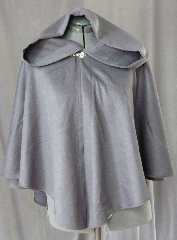 Cloak:2072, Cloak Style:Full Circle Short Cloak, Cloak Color:Grey, Fiber / Weave:50% Cashmere, 50% Wool, Cloak Clasp:Alpine Knot, Hood Lining:Unlined, Back Length:27", Neck Length:21.5", Seasons:Fall, Spring, Winter, Note:This short full circle cloak is perfect <br>for adding just a touch of drama and elegance.<br>Made from a dove grey 50% cashmere, 50% wool blend this lightweight cloak is cuddly soft.<br>Features an oversized hood, unlined.<br>Finished off with a silver-tone alpine style hook-and-eye clasp..