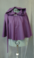 Cloak:2121, Cloak Style:Full Circle Short Cloak with Liripipe, Cloak Color:Imperial Purple, Fiber / Weave:Midweight wool twill, Cloak Clasp:Fleur de Lis, Hood Lining:Unlined, Back Length:23", Neck Length:21.5", Seasons:Fall, Spring, Note:This short full circle cloak is perfect<br>for adding just a touch of drama and elegance.<br>Made from a plum purple wool twill,<br>this midweight cloak is soft.<br>Features an oversized liripipe hood, unlined.<br>Finished off with a pewter fleur de lis hook-and-eye clasp.<br>Dry Clean..