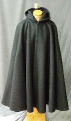 Cloak:2201, Cloak Style:Full Circle Cloak, Cloak Color:Black, Fiber / Weave:32 oz. Wool Melton Extra Heavy, Hood Lining:Unlined, Back Length:52.5", Neck Length:24.5", Seasons:Winter, Note:32 ounce wool is so thick it's like wearing your own room!<br>Wind resistant, water resistant and durable,<br>this cloak will stand up to winter weather.<br>Dry Clean only.