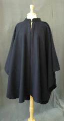 Cloak:2380, Cloak Style:Cape / Ruana with Collar, Cloak Color:Navy Blue, Fiber / Weave:80% Wool/ 20% Nylon Wide Herringbone tone on tone pattern, Cloak Clasp:Triple Medallion, Hood Lining:N/A, Back Length:40", Neck Length:21.5", Seasons:Winter, Fall, Spring, Note:A cross between a cape and a cloak, a ruana<br>is a great way to keep warm when<br>frequent, unhindered use of your arms is needed..
