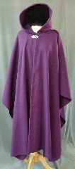 Cloak:2404, Cloak Style:Cape / Ruana, Cloak Color:Rich Plum Purple, Fiber / Weave:Pill resistant mid weight fleece, Cloak Clasp:Vale, Hood Lining:Self-lining, Back Length:49.5", Neck Length:23.5", Seasons:Fall, Spring, Southern Winter, Note:Midweight washable fleece provides a lightweight<br>warmth.  Suitable for  late spring,  early fall<br>or cool summer evenings.<br>You can even wrap up in it to watch TV,<br>safe from the savage winter drafts!<br>A cross between a cape and a cloak,<br>a ruana is a great way to keep warm<br>when frequent, unhindered use of your arms is needed..