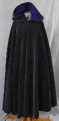 Cloak:2454, Cloak Style:Full Circle Cloak, Cloak Color:Black, Fiber / Weave:Cotton Upholstery Velvet, washed, Cloak Clasp:Triple Medallion, Hood Lining:Blue Polyester Velvet, Back Length:52", Neck Length:21", Seasons:Winter, Fall, Spring, Note:This cloak was created from thick rich<br>washed cotton upholstery velvet.<br>Thicker than many wool coatings,<br>this velvet cloak provides significant warmth and wind resistance.<br>Machine wash low, gentle, tumble dry low..