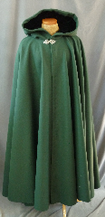Cloak:2462, Cloak Style:Full Circle Cloak, Cloak Color:Forest Green, Fiber / Weave:100% Wool Melton, Cloak Clasp:Triple Medallion, Hood Lining:Black Silk Velvet, Back Length:54", Neck Length:22", Seasons:Winter, Fall, Spring.