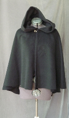 Cloak:2513, Cloak Style:Fuller Half Circle Child's, Cloak Color:Black, Fiber / Weave:Plush Wool Coating, Cloak Clasp:Plain Rope<br>Hook & Eye, Hood Lining:Unlined, Back Length:29", Neck Length:18.5", Seasons:Southern Winter, Fall, Spring, Note:This short cloak is a fuller half circle.<br>The smaller neck makes this a good choice for a child.