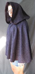 Cloak:2520, Cloak Style:Fuller Half Circle Short, Cloak Color:Purple with Black Herringbone, Fiber / Weave:Herringbone Wool, Cloak Clasp:Alpine Knot - Silvertone, Hood Lining:Unlined, Back Length:26", Neck Length:18", Seasons:Fall, Spring.