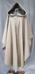 Cloak:2549, Cloak Style:Cape / Ruana, Cloak Color:Beige, Fiber / Weave:Wool Melton, Cloak Clasp:Gothic Heart, Hood Lining:Brown Cotton Velvet, Back Length:51", Neck Length:25", Seasons:Fall, Winter, Spring, Note:This cloak would normally go for a much higher price,<br>but we are offering it at a reduction as it is a<br>piece made by one of our apprentices<br>and there are some imperfections in the front..