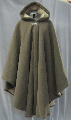 Cloak:2625, Cloak Style:Cape / Ruana extra long (32") over the shoulder, Cloak Color:Mocha Brown, Fiber / Weave:300 Wt Fleece, Cloak Clasp:Vale, Hood Lining:Self-lining (tan fuzzy fleece), Back Length:43", Neck Length:23", Seasons:Winter, Fall, Spring, Note:A cross between a cape and a cloak, a ruana<br>is a great way to keep warm while<br>frequent, unhindered use of your arms <br>is needed. Ruanas make great driving cloaks!<br>This Ruana is extra long (32")<br>over the shoulders for even more coverage.<br>Machine washable cold gentle, tumble dry low.<br>Throw it on and go!.