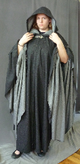 Cloak:3036, Cloak Style:Full Circle Cloak Reversible, Cloak Color:Heathered Black outside<br>Heathered Grey inside, Fiber / Weave:80% Wool / 20% Broken<br>Twill Weave Wool, Cloak Clasp:Gothic Heart, Hood Lining:Unlined Reversible, Back Length:56", Neck Length:21", Seasons:Fall, Spring, Note:Fully reversible with and elegant drape<br>this double sided cloak<br>allows you to choose between<br>your dark or light side at a whim.<br>Made from broken twill weave<br>wool and adorned with a gothic heart<br>hook and eye clasp.<br>Dry clean only..