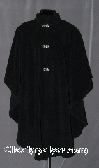 Cloak:2805, Cloak Style:Collared Ruana Cloak Casco Bay<br>inspired, with 29" shoulder, Cloak Color:Black, Fiber / Weave:Windblock Polar Fleece, Cloak Clasp:Vale, Hood Lining:N/A, Back Length:47", Neck Length:24", Seasons:Spring, Fall, Southern Winter, Winter, Note:Inspired by the former Casco<br>Bay Works in Portland, Maine.<br>This gorgeous Ruana cloak is perfect for<br>cold windy weather.<br>Shallow cut sides allow for easy arm<br>movement for driving while still<br>providing coverage.<br>Finished with 3 Vale hook & eye clasps<br>Machine Washable..