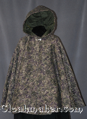 Cloak:2881, Cloak Style:Full Circle Short Cloak<br>(Ranger's Apprentice), Cloak Color:Mottled Moss green,<br>Dusky purple,<br>Mushroom brown, Tan., Fiber / Weave:100% Polyester, Woven, Cloak Clasp:Alpine Knot - Silvertone, Hood Lining:Dusty Green Velvet, Back Length:32", Neck Length:21", Seasons:Fall, Spring, Note:Become invisible in the<br>dense forests of Araluen<br>with this mid length mottled<br>moss green, dusky purple, mushroom brown,<br>and tan cloak.<br>This cloak would be the pride<br>of any Ranger's Apprentice; short enough<br>for scouting and hiking<br>but long enough to hide from enemies.<br>Machine washable..