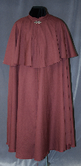 Cloak:2887, Cloak Style:Full Circle Cloak<br>Victorian Mantle, Cloak Color:Maroon, Fiber / Weave:100% Wool, Cloak Clasp:Vale, Hood Lining:N/A, Back Length:55", Neck Length:21", Seasons:Fall, Spring, Note:This Victorian full circle cloak<br>is designed with a 19.5" mantle and<br>collar instead of a hood<br>to allow for a top hat. This<br>lightweight cloak is versatile enough<br>to be used for the fantastical<br>to everyday, as it drapes elegantly<br>over any clothing with a<br>dramatic swoosh when needed.<br>Dry clean only..