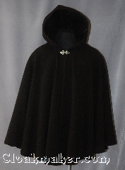 Cloak:2907, Cloak Style:Shaped Shoulder Short Cloak, Cloak Color:Dark Chocolate Brown, Fiber / Weave:100% Wool, Cloak Clasp:Vale, Hood Lining:Unlined, Back Length:33", Neck Length:23", Seasons:Fall, Spring, Southern Winter, Note:A yummy Dark chocolate Brown<br>wool cloak that will add to any wardrobe.<br>Perfect for cool evenings and mild winters.<br>Short enough to allow easy use of<br>arms for an adult or a first cloak<br>for a young adult.<br>Made of 100% wool and adorned<br>with a Silver tone Vale clasp.<br>Dry clean only..