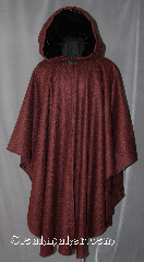 Cloak:2919, Cloak Style:Cape / Ruana, Cloak Color:Black and Maroon, Fiber / Weave:100% Wool, Cloak Clasp:Vale, Hood Lining:Black Velvet, Back Length:47", Neck Length:21", Seasons:Fall, Spring, Note:This black and maroon Ruana cloak<br>will add respect and awe to any outfit.<br>It's fine 100% wool is designed to<br>keep warm while frequent, unhindered<br>use of your arms is needed.<br>A cross between a cape and a cloak,<br>Ruanas make great driving cloaks!<br>This gorgeous woven wool cloak has<br>a soft, elegant black lined hood<br>with 27" long sides..