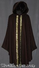 Cloak:2986, Cloak Style:Shaped Shoulder, Cloak Color:Brown, Fiber / Weave:100% Wool melton, Cloak Clasp:Snap Button, Hood Lining:Brown Velvet, Back Length:48", Neck Length:25", Seasons:Fall, Spring, Note:This soft brown Ruana is a delightful<br>addition to any wardrobe.<br>Perfect for driving to those cool<br>evenings outdoor events.<br>A cross between a cape and a cloak,<br>a ruana is a great way to keep<br>warm while frequent, unhindered<br>use of your arms is needed.<br>The sides reach with an<br>overarm of 36" and accented<br>with Cross Gold, Green, White, Brown<br>trim edging around the hood and front.<br>Dry clean only..