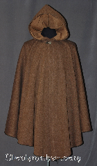 Cloak:3014, Cloak Style:Ruana Ranger Cloak, Cloak Color:Brown Black Amber, Fiber / Weave:100% Cotton, Cloak Clasp:Sissel Pewter, Hood Lining:Unlined, Back Length:43", Neck Length:20", Seasons:Fall, Spring, Note:One of a kind ruana ranger cloak<br>made of a camouflage brown<br>and black twill cotton.<br>Accented with a silvertone Sissel<br>pewter clasp add to the elegant look.<br>Machine washable.<br>Can not be reproduced..
