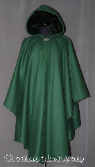 Cloak:3015, Cloak Style:Ruana, Cloak Color:Forest Green, Fiber / Weave:100% Wool, Cloak Clasp:Vale, Hood Lining:Green Velvet, Back Length:49", Neck Length:22", Seasons:Fall, Spring, Southern Winter, Winter, Note:This green ruana cloak is a gorgeous<br>Forest green with matching velvet lining.<br>Made of mid-weight wool with<br>shortened sides allowing for a<br> wide range of movement.<br>Perfect for driving on cold days.<br>Accented with a Silver tone<br>Vale hook-and-eye clasp.<br>Dry Clean only..