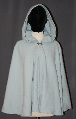 Cloak:3037, Cloak Style:Full Circle Short Cloak<br>Youth/Petite, Cloak Color:Sky Blue, Fiber / Weave:80% Wool / 20% Nylon, Cloak Clasp:Sissel Pewter, Hood Lining:Unlined, Back Length:28", Neck Length:18", Seasons:Fall, Spring, Southern Winter, Note:A soft baby blue short cloak<br>eels like fleece and is<br>perfect for any youth on chilly days,<br>Adorned with a pewter sissel<br>hook and eye clasp<br>this cloak will grow with your child<br>and last many more years than a coat.<br>Spot clean for small messes.<br>Dry clean only.
