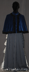 Cloak:3079, Cloak Style:Shape shoulder short hoodless Victorian Cape, Cloak Color:Royal Blue / Black trim, Fiber / Weave:Cotton Velveteen, Cloak Clasp:Snap Button, Hood Lining:N/A, Back Length:21.5", Neck Length:20.5", Seasons:Fall, Spring, Southern Winter, Note:A hood-less true Victorian<br>short cape with black trim<br>Perfect for any age.<br>Designed for a elegant<br>night out on the town.<br>Accented with a mandarin<br>collar and snap clasp.<br>Hand washable..