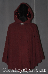 Cloak:3123, Cloak Style:Full Circle Cloak Short, Cloak Color:Heathered maroon, Fiber / Weave:100% Wool, Cloak Clasp:Vale, Hood Lining:Maroon silk Velvet, Back Length:32", Neck Length:20.5", Seasons:Fall, Spring, Southern Winter, Note:A wonderful starter cloak for a<br>child or adult in a<br>heathered maroon wool sized<br>for play and walking.<br>With a plush silk velvet maroon lined hood and vale clasp.<br>Dry clean or spot wash only..