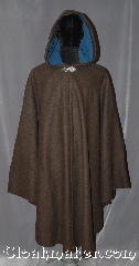 Cloak:3131, Cloak Style:Shaped Shoulder Ruana Cloak, Cloak Color:Heathered Brown, Fiber / Weave:100% Wool  Melton, Cloak Clasp:Triple Medallion, Hood Lining:Indigo blue cotton velvet, Back Length:46"<br>overarm 36", Neck Length:22.5", Seasons:Fall, Spring, Southern Winter, Winter, Note:This gorgeous warm heathered brown<br>shape shoulder ruana cloak with an<br>indigo blue velvet hood is<br>perfect for a night on the town.<br>Made of a wool blend melton<br>with flecks of color throughout,<br>it is mesmerizing.<br>A cross between a cape and a cloak,<br>a ruana is a great way to keep warm<br>while frequent, unhindered use of<br>your arms is needed.<br>With an overarm of 36" this cloak<br>has less bulk than a<br>traditional Ruana and<br>makes a great driving cloak!<br>Can be hemmed to height<br> Dry Clean Only.