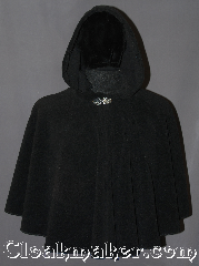 Cloak:3159, Cloak Style:Cape / Ruana / Shaped Shoulder short, Cloak Color:Black, Fiber / Weave:Windbloc Fleece, Cloak Clasp:Vale, Hood Lining:Self-lining, Back Length:23", Neck Length:23", Seasons:Winter, Fall, Spring, Note:A elegant wrap for cold winters<br>or child's starter cloak.<br>Made of Windbloc Fleece (a thick<br>plush material that is warm
and windproof)<br>this cloak is perfect for cold winters.<br>The Ruana shape with 20" shortened<br>sides allows easy arm access for<br>everyday activities.<br>The cloak is competed<br>with a silver tone Vale hook and eye clasp.<br>Machine washable.<br>DO NOT DRY CLEAN.