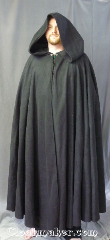 Cloak:3181, Cloak Style:Full Circle Cloak, Cloak Color:Black, Fiber / Weave:100% polyester economy fleece, Cloak Clasp:Vale, Hood Lining:Unlined, Back Length:54.5", Neck Length:25", Seasons:Fall, Spring, Note:Lightweight economy fleece <br>provides  warmth with very little weight.<br>Suitable for indoor wear late spring,<br>early fall, cool summer evenings<br>or just snuggling on the couch.<br>Machine washable..