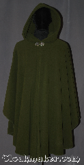 Cloak:3200, Cloak Style:Shaped Shoulder Ruana Cloak, Cloak Color:Olive Green, Fiber / Weave:WindPro Fleece, Cloak Clasp:Triple Medallion, Hood Lining:Unlined faux shearling<br>interior double sided fabric, Back Length:43" back<br>28" overarm, Neck Length:22", Seasons:Fall, Spring, Winter, Note:A classic olive green windpro<br>shape shoulder ruana<br>that will keep you warm<br>and dry on chilly nights.<br>This soft and cuddly cloak<br>has a faux shearling interior<br>texture for extra comfort<br>and a water resistant<br>outer layer to keep you dry<br>during light rain/snow.<br>The silvertone triple medallion<br>clasp is the final touch on this<br>functional and elegant cloak.<br>This shape shoulder ruana<br>makes a great driving cloak<br>with shorter sides and less<br>bulk easy arm mobility . <br>Machine washable<br>DO NOT DRY CLEAN..