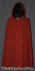 Cloak:3211, Cloak Style:Shaped Shoulder Cloak with arm slits, Cloak Color:Sienna rust red, Fiber / Weave:100% Wool coating, Cloak Clasp:Vale - Goldtone, Hood Lining:Garnet red Velvet, Back Length:44", Neck Length:21", Seasons:Southern Winter, Fall, Spring, Note:Gorgeous and earthy,<br>this sienna rust<br>shape shoulder cloak<br>with side arm slits<br>is designed with less bulk<br>of a full circle and easy arm<br>access with arm slits<br>this is a versatile cloak for<br>everyday activities and driving.<br>With accents of a garnet lined<br>hood and a goldtone vale clasp<br> this cloak is perfect for fall fashion.<br>Dry or spot clean only..