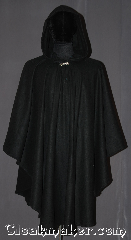 Cloak:3278, Cloak Style:Ruana Pullover Cloak, Cloak Color:Black, Fiber / Weave:Malden mills polyester fleece, Cloak Clasp:Stina Pewter, Hood Lining:Unlined, Back Length:40" back<br>26" overarm, Neck Length:20", Seasons:Southern Winter, Fall, Spring, Note:Kitten soft this high quality fleece<br>pullover ruana is easy care and<br>easy use. A cross<br> between a cape and a cloak,<br>a ruana is a great way to keep warm<br>while frequent, unhindered use of<br>your arms is needed with a<br>closed front with no drafts.<br>Machine washable no pilling..