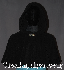 Cloak:3283, Cloak Style:Full Circle Short Cloak, Cloak Color:Black, Fiber / Weave:Windblock Polar Fleece, Cloak Clasp:Vale, Hood Lining:Unlined, Back Length:17", Neck Length:22", Seasons:Winter, Southern Winter, Fall, Spring, Note:A perfect short capelet for a starter cloak<br>or formal evening during cold receptions.<br>Made of warm black wind-block<br>polar fleece and adorned with an<br>elegant Vale pewter clasp.<br>100% polyester machine washable<br>DO NOT DRY CLEAN..