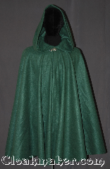 Cloak:3303, Cloak Style:Full Circle Cloak w/ lirapipe hood, Cloak Color:Green, Fiber / Weave:Fleece, Cloak Clasp:Vale, Hood Lining:Unlined, Back Length:42", Neck Length:20.5", Seasons:Fall, Spring, Note:This green lightweight economy fleece<br>lirepipe full circle short cloak provides<br>warmth with very little weight.<br>Suitable for indoor wear late spring,<br>early fall, cool summer evenings<br>or just snuggling on the couch.<br>A lirepipe is both useful and fashionable<br>when you wrap the elongated hood<br>around your neck in windy weather.<br>Easy care /machine washable..