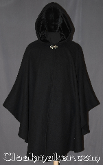 Cloak:3311, Cloak Style:Shaped Shoulder Ruana Cloak, Cloak Color:Black, Fiber / Weave:100% Wool, Cloak Clasp:Vale, Hood Lining:Black Silk Velvet, Back Length:41.5", Neck Length:23", Seasons:Winter, Southern Winter, Fall, Spring, Note:A warm and classic Shape Shoulder<br>Ruana cloak for cool fall evenings.<br>Made from 100% wool melton.<br>This cloak has a basic vale clasp<br>and black silk velvet hood lining.<br>An elegant cross between<br>a cape and a cloak, a ruana is a great way <br>to keep warm while frequent, unhindered<br>use of your arms is needed.<br>Ruanas make great driving cloaks!<br>Spot or dry clean only..