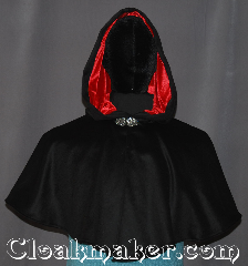 Cloak:3352, Cloak Style:Full Circle Cloak Short, Cloak Color:Black, Fiber / Weave:100% Cashmere, Cloak Clasp:Vale, Hood Lining:Red Rayon Velvet, Back Length:18", Neck Length:19", Seasons:Fall, Spring, Summer, Note:100% cashmere! This short<br>full circle cloak/capelet<br>is great for children and young adults<br>Ultra soft and elegant for cool evenings<br>with a red velvet lined hood<br>and vale clasp.<br>Dry or spot clean only..