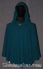 Cloak:3425, Cloak Style:Full Circle Cloak Short, Cloak Color:Teal/Mallard Blue, Fiber / Weave:Polyester, Cloak Clasp:Vale, Hood Lining:Unlined, Back Length:28", Neck Length:20", Seasons:Summer, Fall, Spring, Note:Easy care polyester this<br>short mallard teal cloak is an easy and<br>elegant choice with a dramatic drape<br>for a little extra warmth<br>on a cold evening.<br>Great for a child to grow into<br>or a elegant wrap for night on the town.<br>Machine washable cold gentle, tumble dry low.<br>Throw it on and go!.