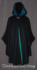 Cloak:3519, Cloak Style:Shape Shoulder Ruana, Cloak Color:Navy Blue Heathered with cobalt and green, Fiber / Weave:100% Wool Melton, Cloak Clasp:Vale, Hood Lining:Teal moleskin<br> and green/teal ribbon<br>along interior edge, Back Length:45" back<br>31" arm, Neck Length:20.5", Seasons:Southern Winter, Fall, Spring, Note:The pictures do not do this cloak justice.<br>A cross between a cape and a cloak,<br>a shape shoulder ruana is a great way<br>to keep warm when frequent,<br>unhindered use of your arms is needed.<br>Ruanas make great driving cloaks!<br>Made from a gorgeous navy blue wool blend<br>heathered with a jewel tone blues and greens<br>The hood is lined with a soft mallard green moleskin<br>and adorned with a classic vale hook-and-eye clasp.<br>Dry Clean Only.