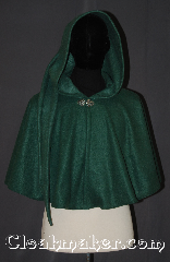 Cloak:3538, Cloak Style:Full circle capelet short /youth, Cloak Color:Green, Fiber / Weave:Polyester Economy Fleece, Cloak Clasp:Vale, Hood Lining:Unlined<br>44" lirepipe, Back Length:21", Neck Length:23", Seasons:Fall, Spring, Note:This green lightweight economy fleece<br>lirepipe full circle short cloak<br>provides warmth with very little weight.<br>Suitable for indoor wear late spring,<br>early fall, cool summer evenings<br>or just snuggling on the couch.<br>A lirepipe is both useful and<br>fashionable when you wrap the elongated<br>hood around your neck in windy weather.<br>Easy care /machine washable..