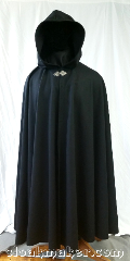 Cloak:3607, Cloak Style:Full Circle Cloak, Cloak Color:Black, Fiber / Weave:80% wool,<br> 20% nylon, Cloak Clasp:Triple Medallion, Hood Lining:Unlined, Back Length:54", Neck Length:24", Seasons:Winter, Note:A heavy black wool blend<br>cloak that lets you feel<br>the crofts at your knees<br>if you're a bonny tall man,<br>but just the right length<br>and heft for anyone with<br>brawny shoulders to keep warm and dry.<br>Dry cleaning recommended,<br>but a good brushing will<br>keep it looking great..