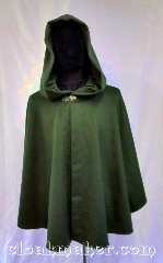 Cloak:3618, Cloak Style:Ruana Shape Shoulder Cloak, Cloak Color:Loden Green, Fiber / Weave:100% Wool, Cloak Clasp:Vale, Hood Lining:Green Moleskin, Back Length:27", Neck Length:22", Seasons:Spring, Fall, Southern Winter, Note:A handsome car cloak for days of<br>autumn or spring when you need a bit<br>more than a sweater.<br>San Francisco summer?<br>Oh this would be great for that!<br> Beautiful loden green with a<br>tiny hint of heathered blue.<br>The hood lining of matching<br>green moleskin also lines the front<br>of the inner cloak for a very finished look.<br>Dry clean only..