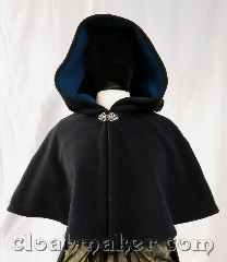 Cloak:3651, Cloak Style:Shaped Shoulder Cloak, Cloak Color:Black, Fiber / Weave:Windblock Fleece, Cloak Clasp:Vale, Hood Lining:teal self lined, Back Length:17", Neck Length:20", Seasons:Southern Winter, Spring, Fall, Note:This shaped shoulder cloak is black<br>and has a teal blue lining.<br>Wind blocking fleece material,<br>machine wash cold using mild<br>detergent and tumble dry on low..