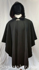 Cloak:3669, Cloak Style:Cape / Ruana, Cloak Color:Black, Fiber / Weave:100% wool, Cloak Clasp:Triple Medallion, Hood Lining:Dark red velvet, Back Length:45", Neck Length:24", Seasons:Winter, Southern Winter, Fall, Spring, Note:A black ruana style cloak with a<br>dark red velvet hood lining.<br>Heavy felted wool melton,<br>great winter weight and<br>excellent wind resistance.<br>Made from 100% wool<br>Dry clean only..