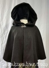 Cloak:3670, Cloak Style:Shaped Shoulder Cloak, Cloak Color:Brown and Black Herringbone, Fiber / Weave:100% wool, Cloak Clasp:Vale, Hood Lining:Black velvet, Back Length:22", Neck Length:21", Seasons:Winter, Southern Winter, Note:A heavy-weight brown and black<br>herringbone pattern with a small<br>amount of white flecks<br>shaped shoulder cloak<br>with a black velvet hood lining.<br>Made from 100% wool<br>Dry clean only..
