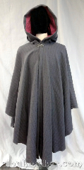 Cloak:3705, Cloak Style:Cape / Ruana, Cloak Color:Slate or dove grey, Fiber / Weave:100% wool, Cloak Clasp:Vale, Hood Lining:Rose pink moleskin, Back Length:46.5", Neck Length:24", Seasons:Spring, Fall, Note:This ruana style cloak with its rose pink<br>moleskin hood lining and silvertone<br>vale clasp is the perfect addition<br>for the chilly spring mornings.<br>Has a pretty pattern in a 100% wool fabric,<br>dry clean only.<br>This cloak is half off original price,<br>there is a spot on the shoulder that<br>was sprayed with FrayCheck<br>and it has left discoloration..