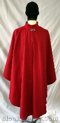 Cloak:3758, Cloak Style:Cape / Ruana, Cloak Color:Crimson Red, Fiber / Weave:80% wool, 20% nylon, Cloak Clasp:Vale, Hood Lining:Hoodless, Back Length:44.5", Neck Length:24", Seasons:Southern Winter, Spring, Fall, Note:A crimson red ruana style cloak<br>in felted wool melton with a<br>military style collar instead of a hood.<br>This cloak is a lighter winter weight<br>with some wind resistance.<br>Made from a wool blend, dry clean only..