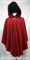 Cloak:3762, Cloak Style:Cape / Ruana, Cloak Color:Crimson Red, Fiber / Weave:80% wool, 20% nylon, Cloak Clasp:Vale, Hood Lining:Black Velvet, Back Length:38", Neck Length:22", Seasons:Southern Winter, Fall, Note:A crimson red ruana style cloak<br>in felted wool melton with a very<br>soft black polyester stretch<br>velvet hood lining.<br>This cloak is a lighter winter weight<br>with some wind resistance.<br>Made from a wool blend, dry clean only..