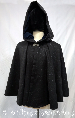 Cloak:3766, Cloak Style:Shaped Shoulder Cloak, Cloak Color:Sparkly Black, Fiber / Weave:Acrylic, Cloak Clasp:Vale, Hood Lining:Dark blue velveteen, Back Length:21", Neck Length:22", Seasons:Spring, Fall, Note:Made from a very soft acrylic<br>with flecks of silver mylar,<br>this cloak has dark blue<br>velveteen lining in the hood,<br>pewter clasp and pockets.<br>Machine gentle, dry low..